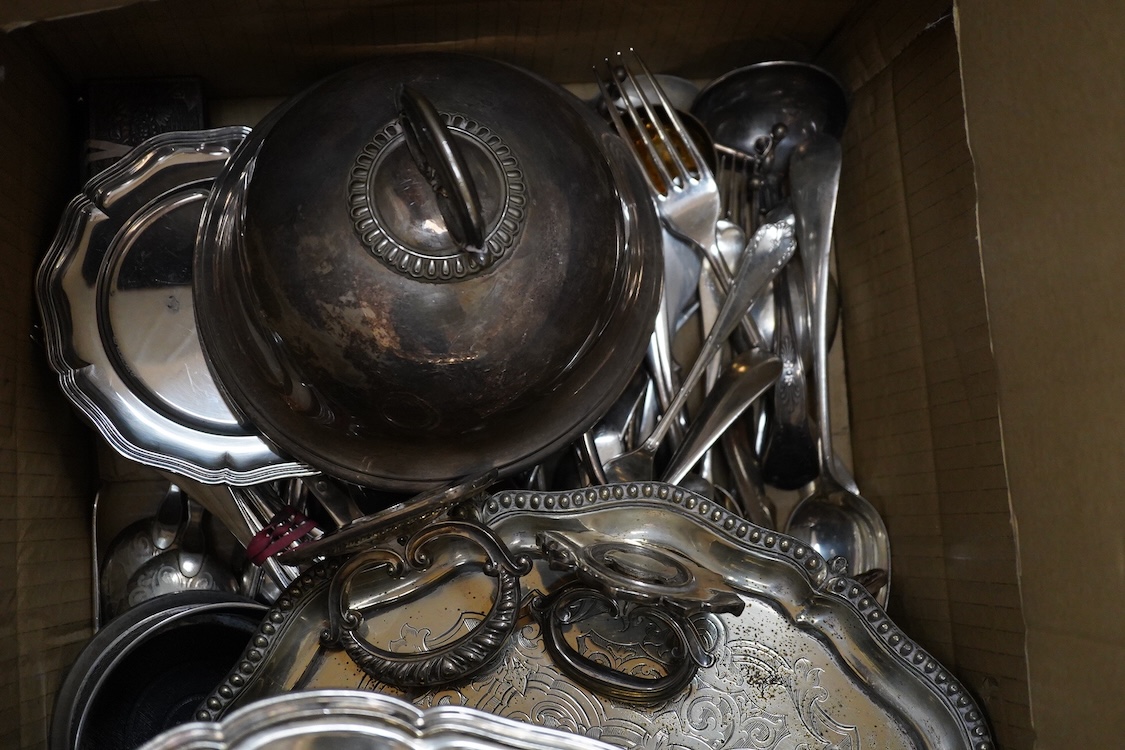 An Old Sheffield plated basket, a plated muffin dish and cover by Elkington & Co and a quantity of assorted plated wares including entrée dishes, flatware, salvers, etc.